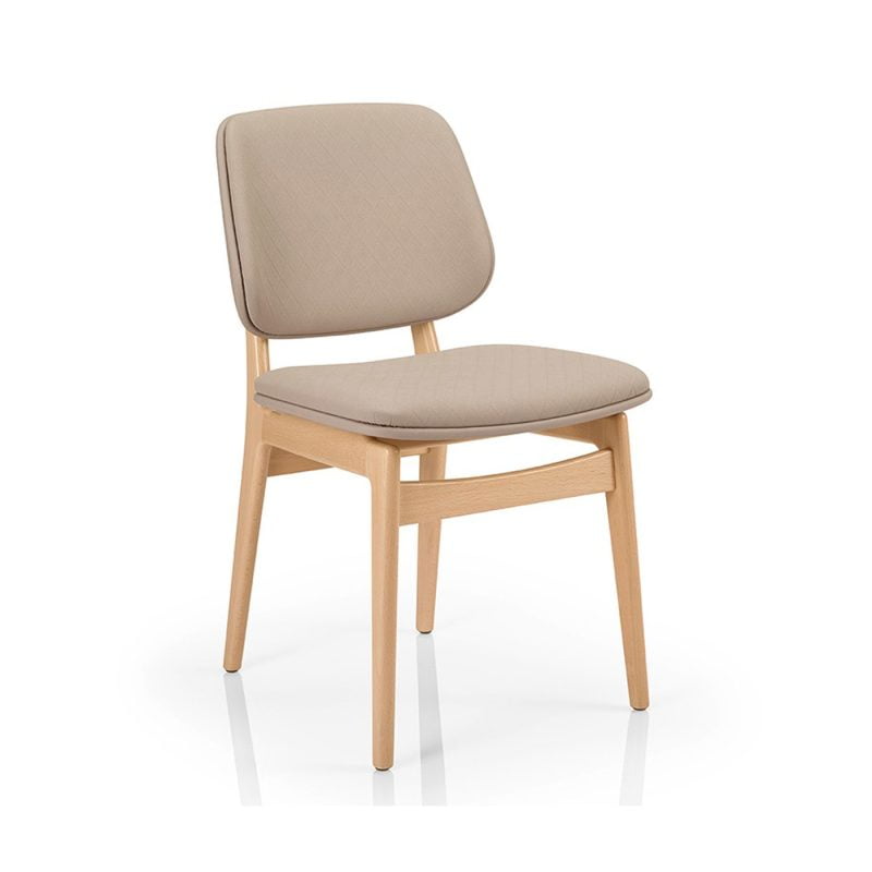 dining chair upholstered with beige leather